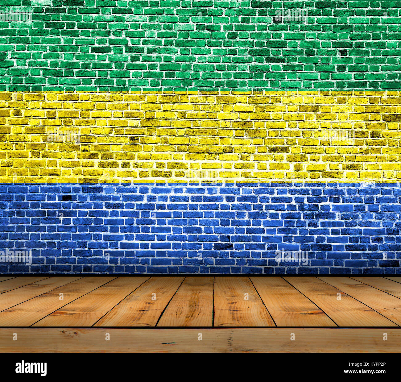 Gabon flag painted on brick wall with wooden floor Stock Photo - Alamy