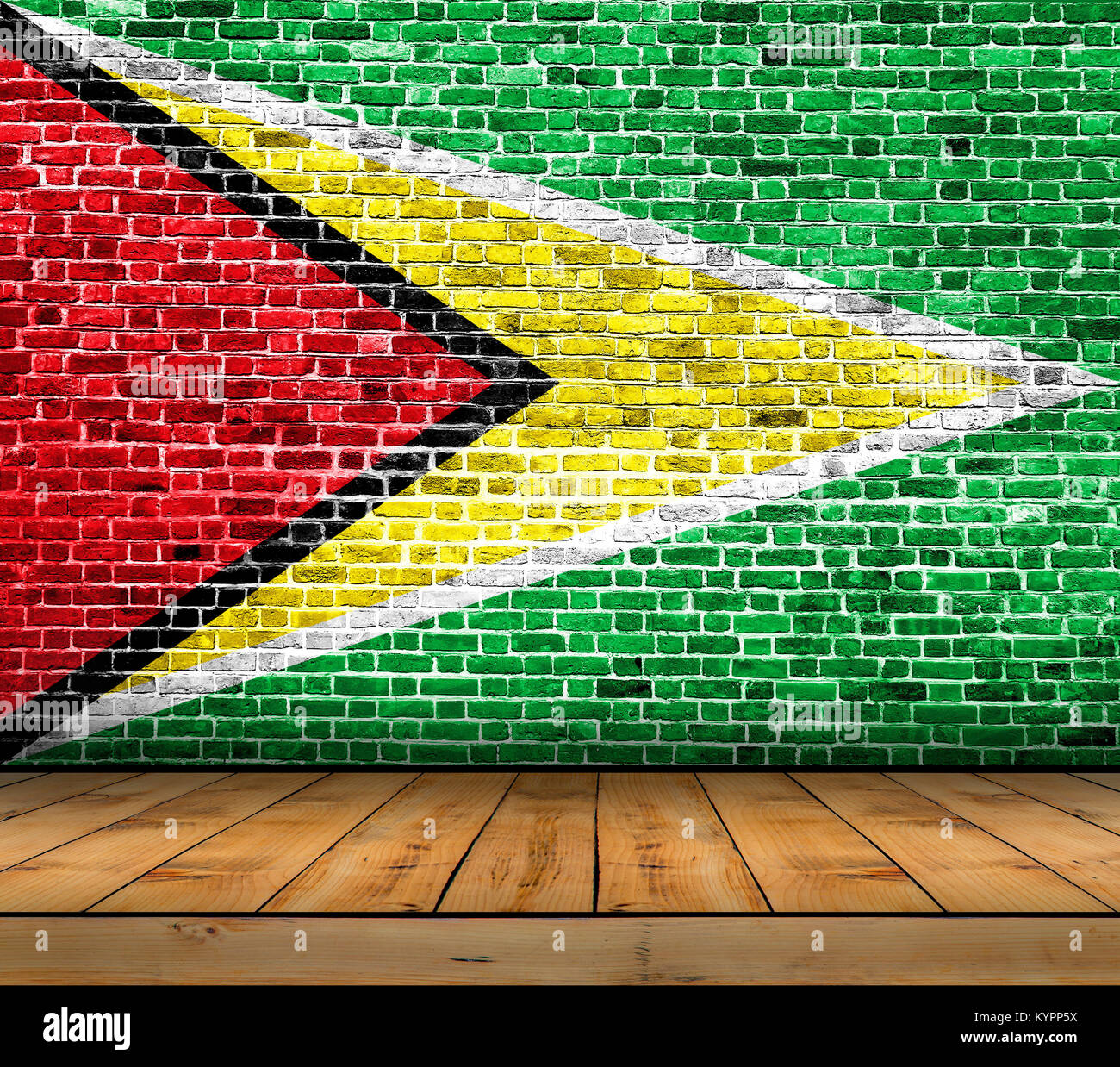 Guyana flag painted on brick wall with wooden floor Stock Photo - Alamy