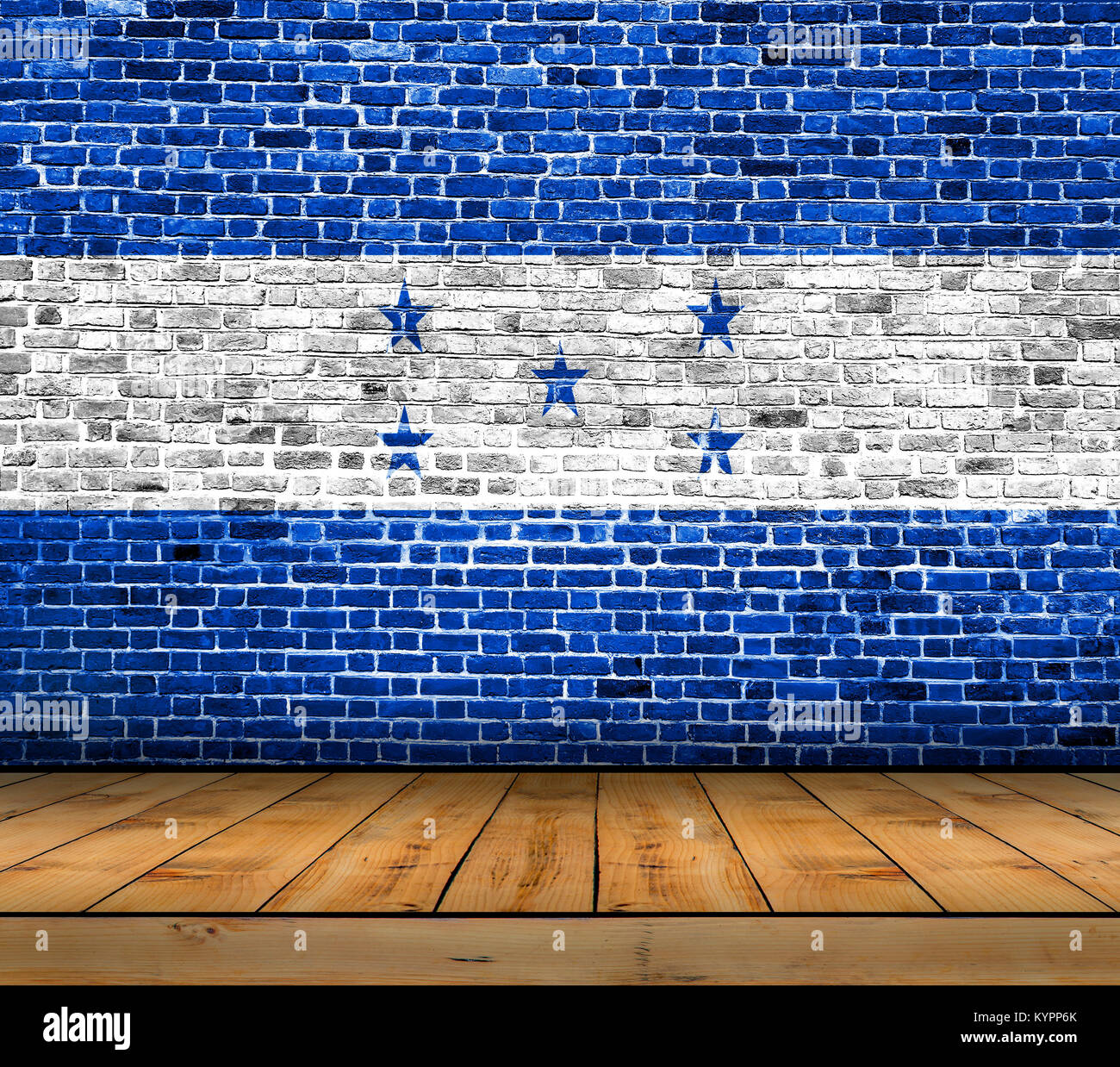 Honduras flag painted on brick wall with wooden floor Stock Photo