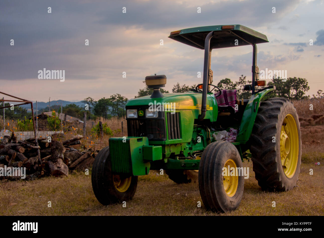 Tractor in a mexican corn field Stock Photo Alamy