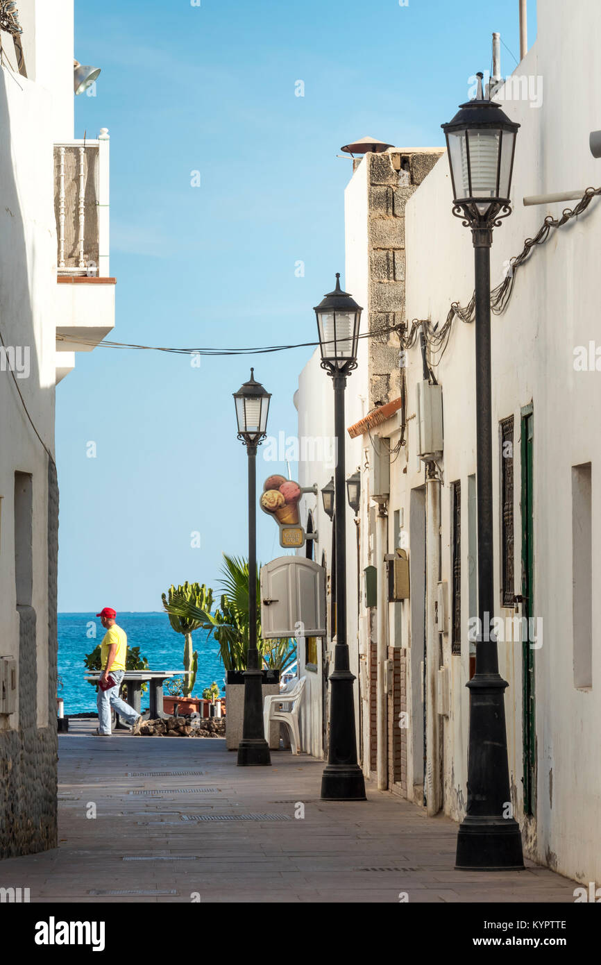 Narrow Street to the sea Corralejo La Oliva Fuerteventura Canary Islands Spain Stock Photo
