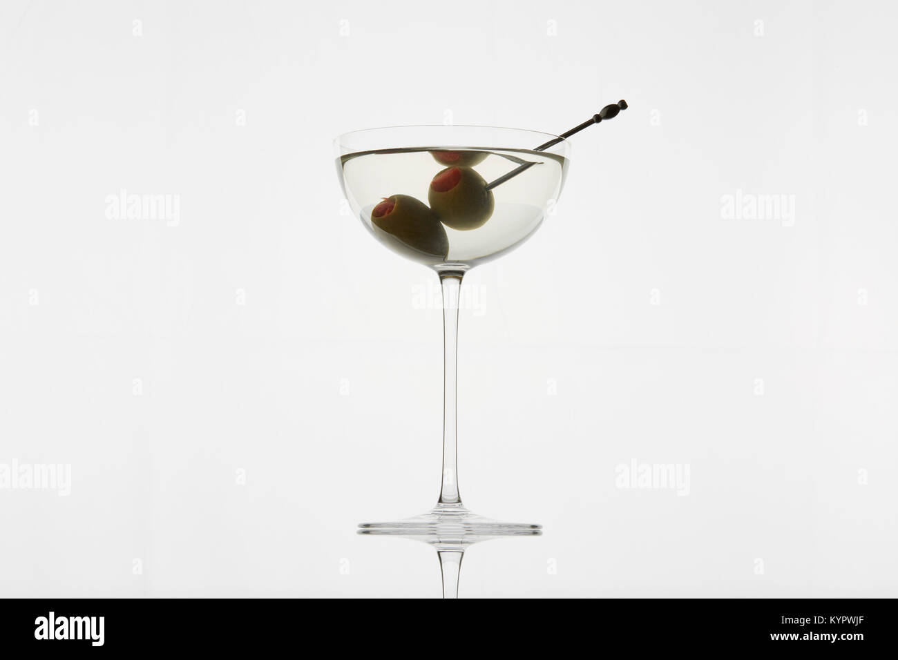 Classic Martini Cocktail photographed backlit on white background Stock