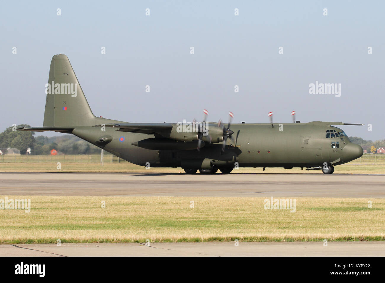 RAF C-130K Hercules C3 taxiing out after landing at Coningsby on a bright summers day. Stock Photo