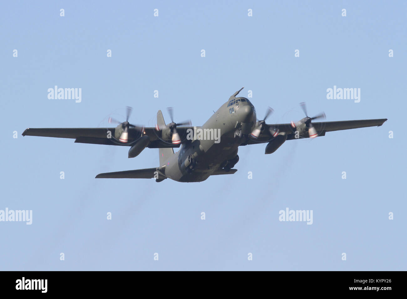 A RAF Hercules C-130 C3 climbing out of RAF Coningsby following a short visit. Stock Photo
