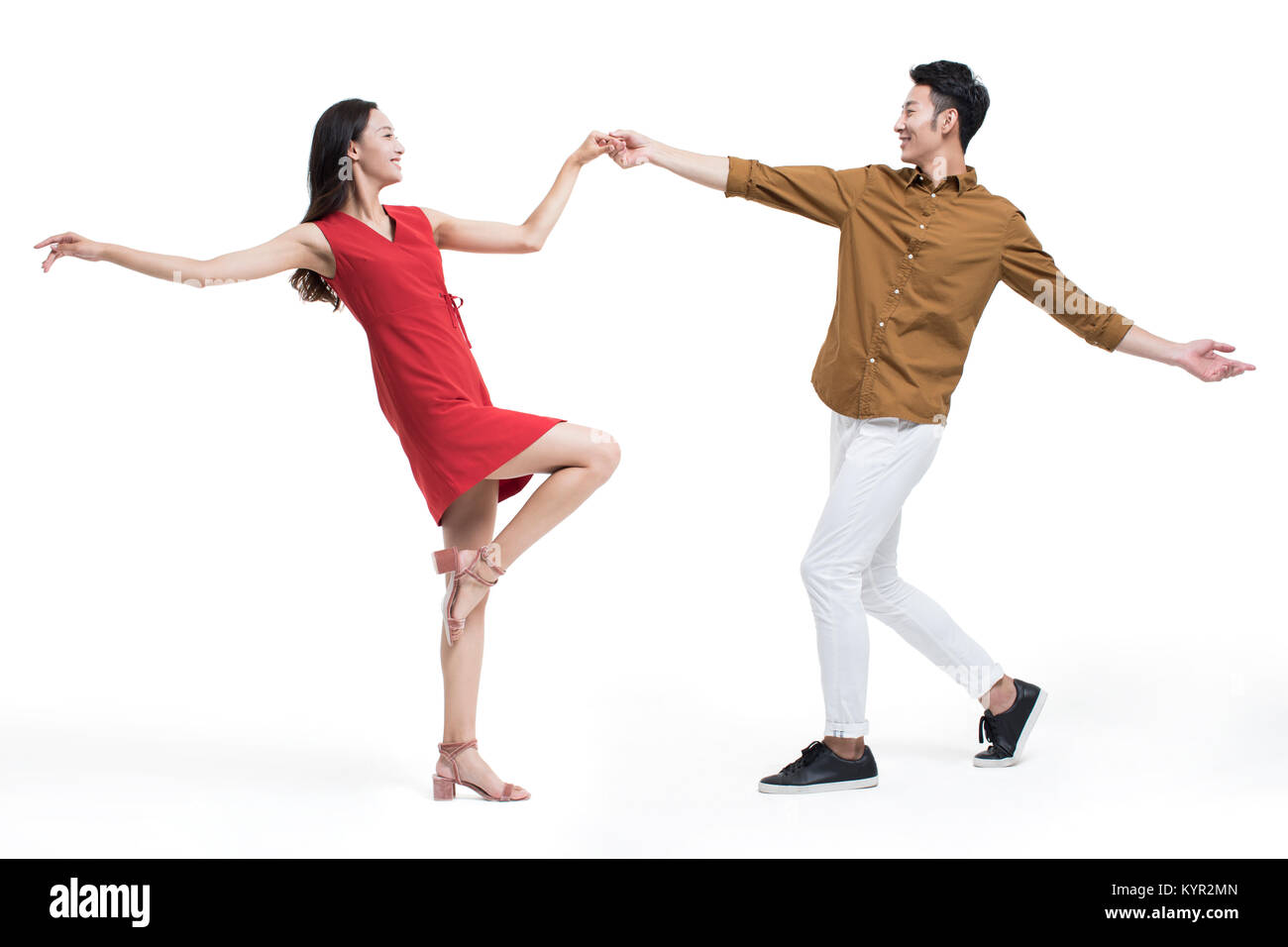 Cheerful young couple dancing Stock Photo