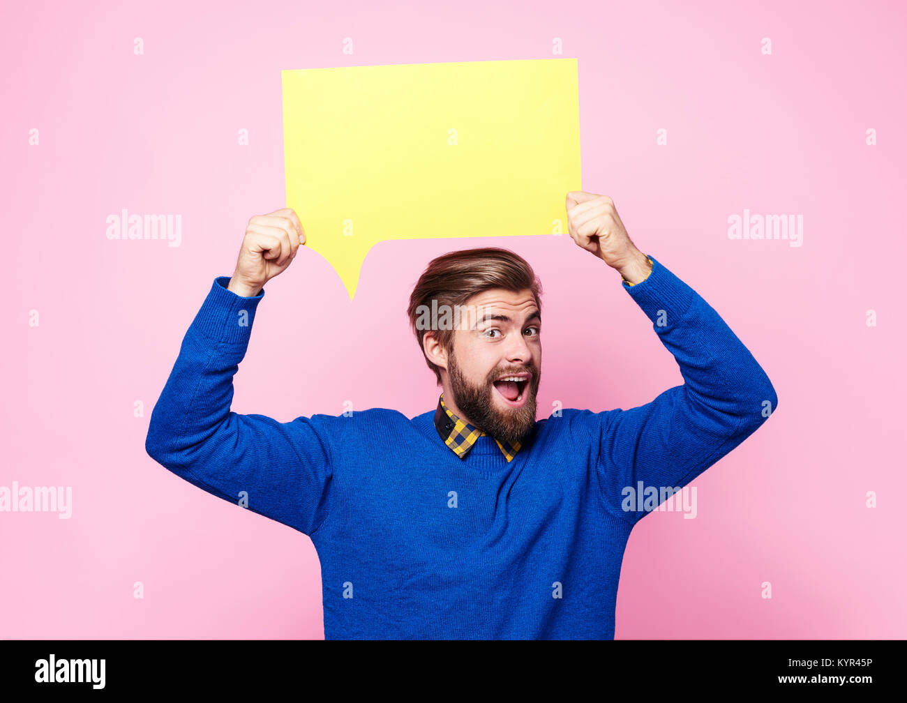 Man holding speech bubble or thought bubble Stock Photo