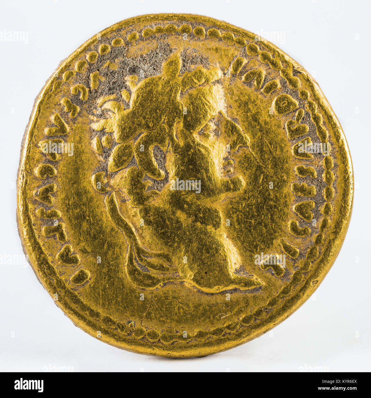 Ancient Roman gold aureus coin of Emperor Tiberius. Obverse. Stock Photo