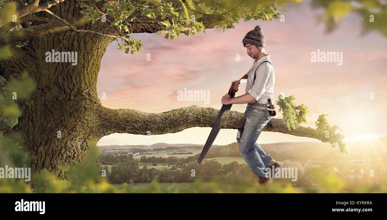 Cutting the branch your sitting on Stock Photo