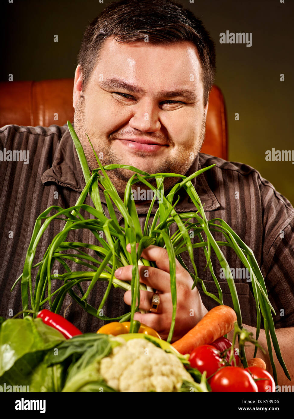 Fat guy eating healthy food hi-res stock photography and images - Alamy