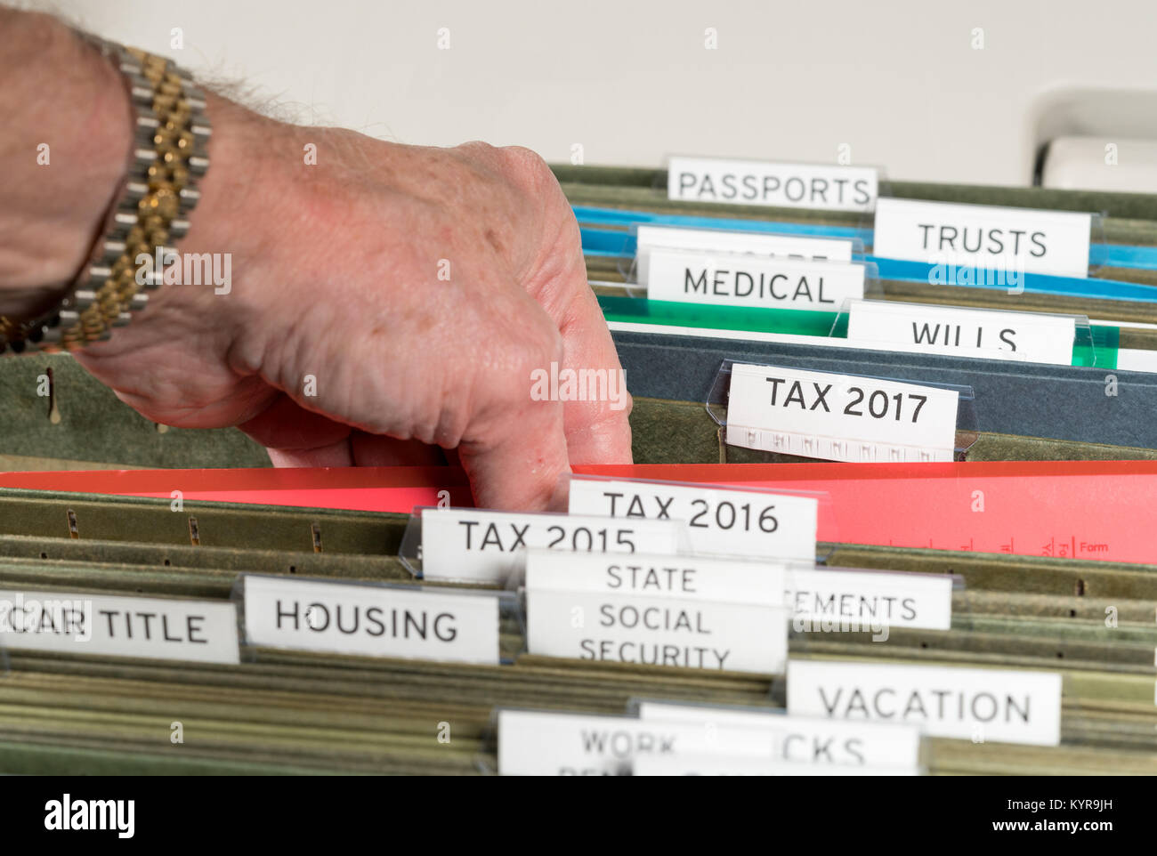 Home filing system for 2017 taxes organized in folders Stock Photo