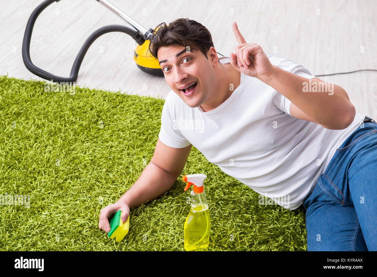 Young husband man cleaning floor at home Stock Photo Alamy