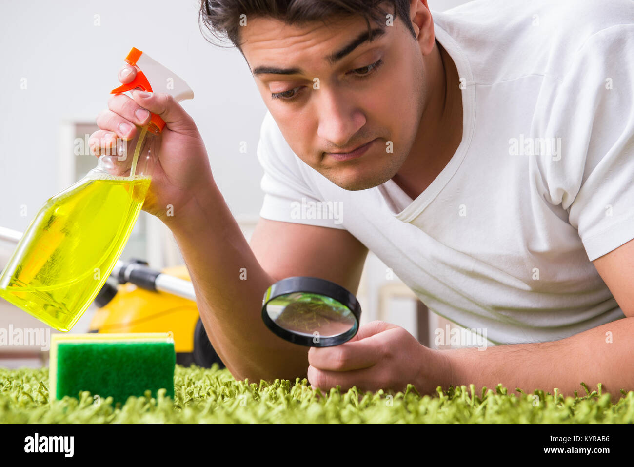 Young husband man cleaning floor at home Stock Photo Alamy