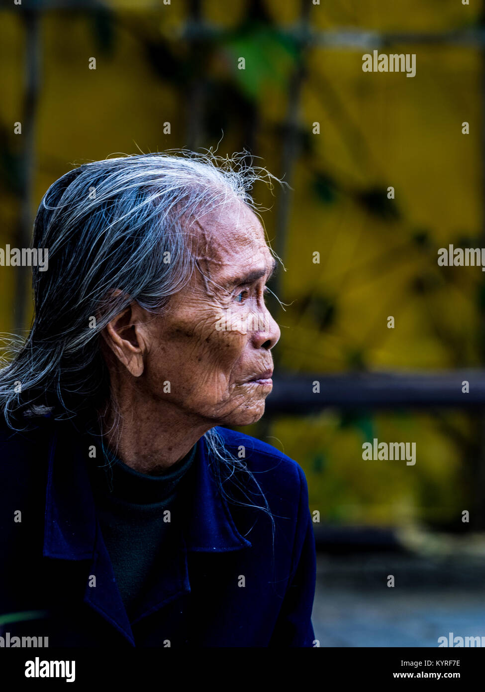 Old lady in Hoi An. Stock Photo
