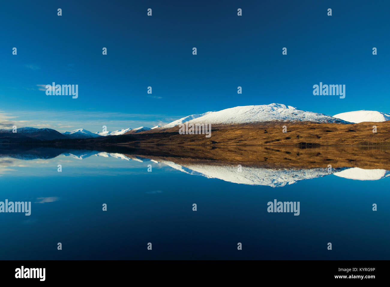 Beinn Toaig reflected in Loch Tulla, Argyll & Bute Stock Photo