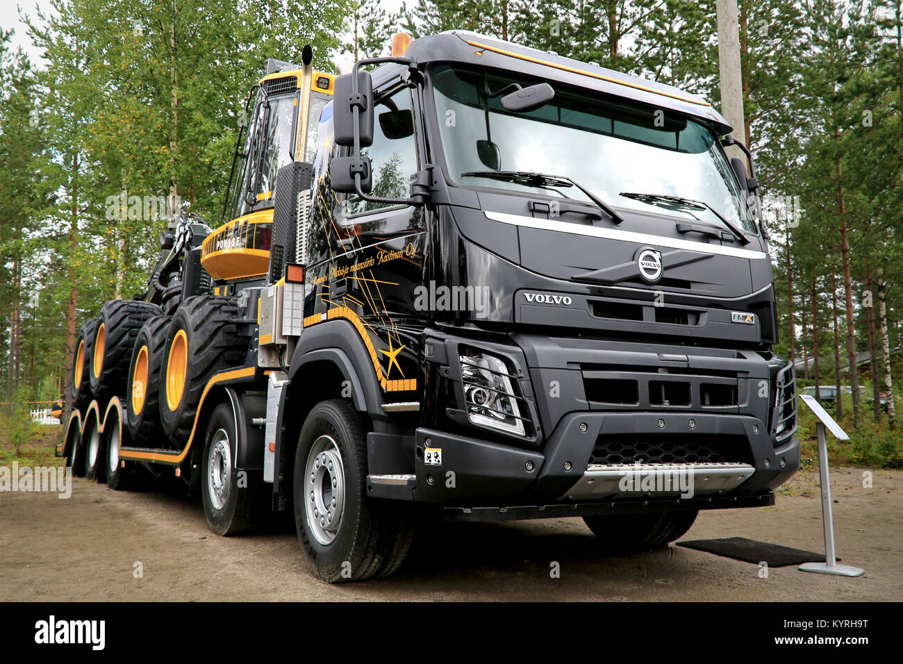 JAMSA, FINLAND - AUGUST 29, 2014: Volvo Trucks presents a black Volvo FMX  10x4 540hp hauling a Ponsse forestry vehicle at FinnMETKO 2014 Stock Photo  - Alamy