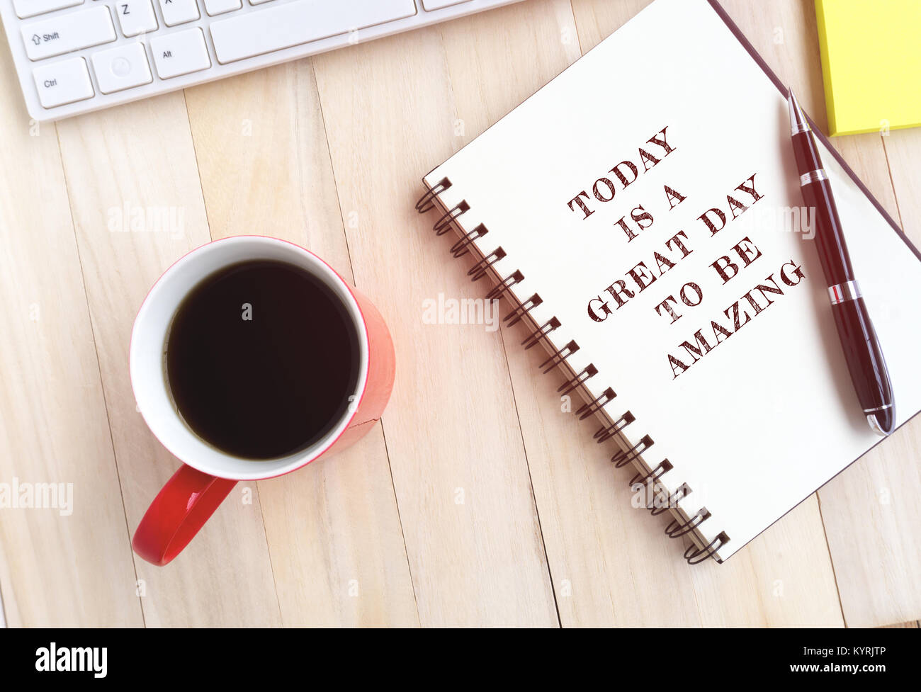 Inspirational quote on notepad - today is a great day to be amazing. Stock Photo