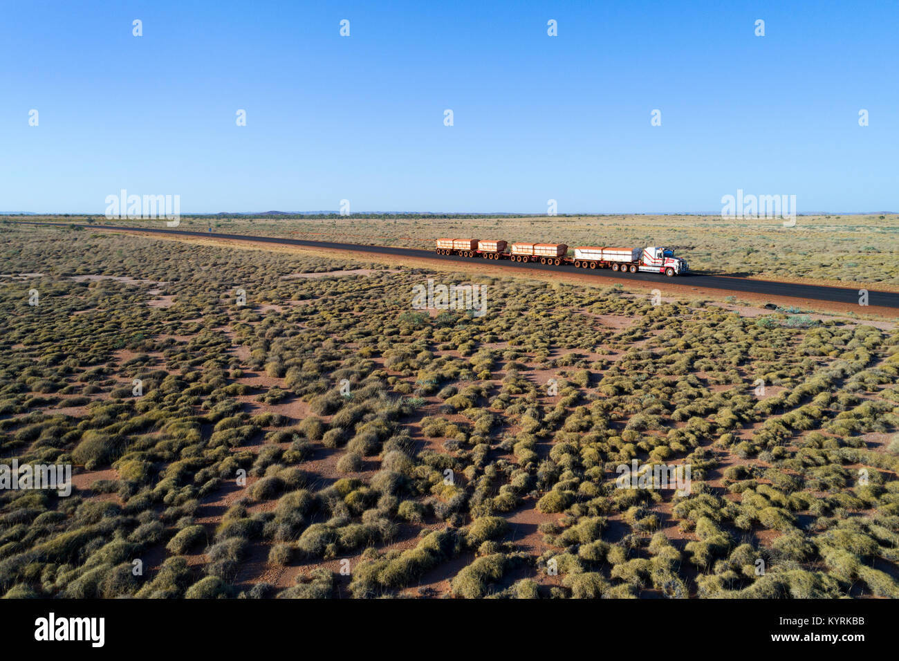 Road train travelling on the Great Northern Highway, Pilbara, Western Australia Stock Photo