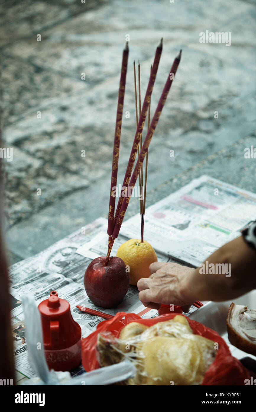 A traditional Chinese burn incense, offering smoking incense, chicken