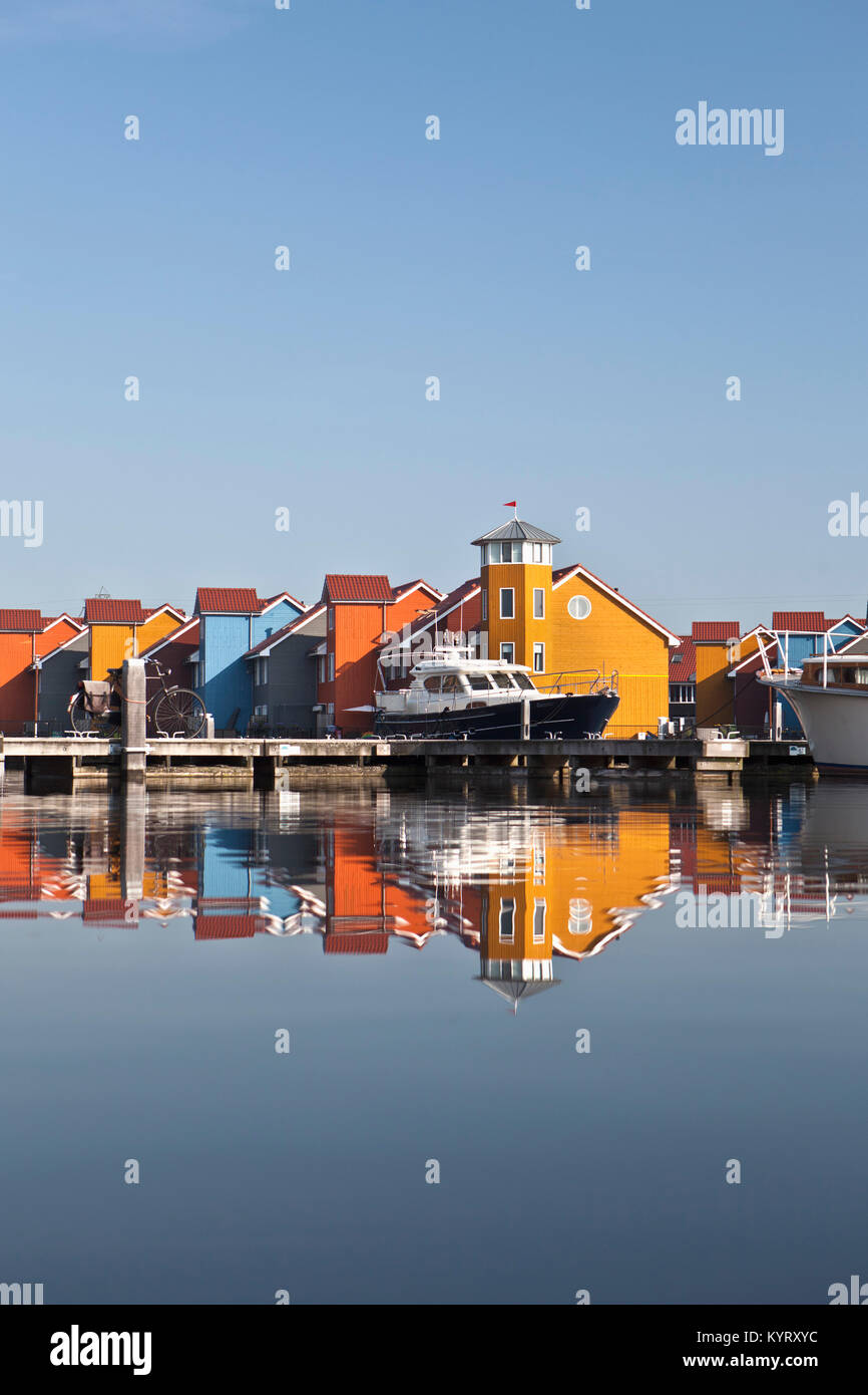 The Netherlands, Groningen, Colourful residential houses and marina called Reitdiephaven. Stock Photo