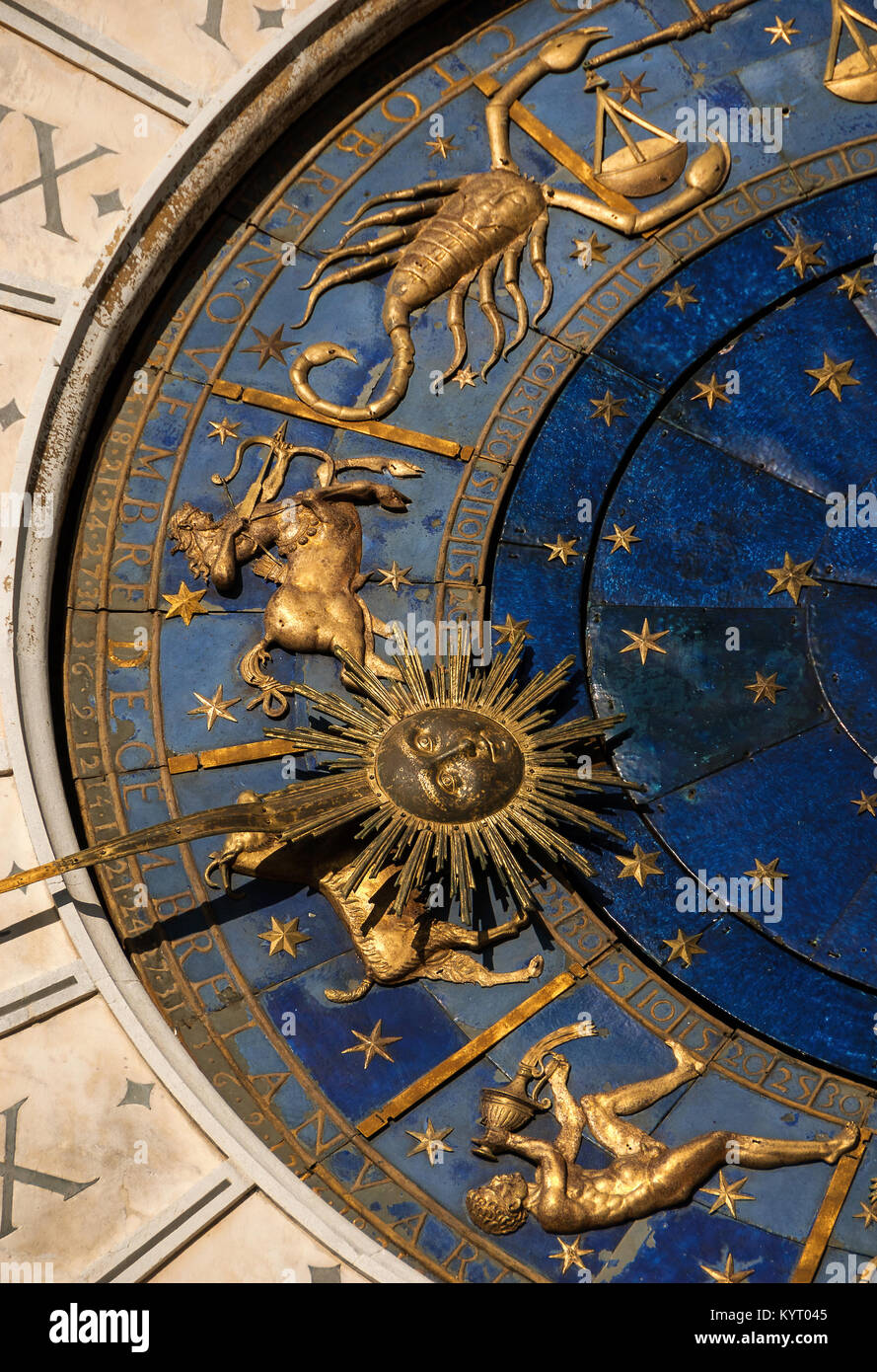 Ancient time and Astrology. Detail of Saint Mark Square renaissance Clock Tower in Venice with zodiac signs, planet and stars (15th century) Stock Photo