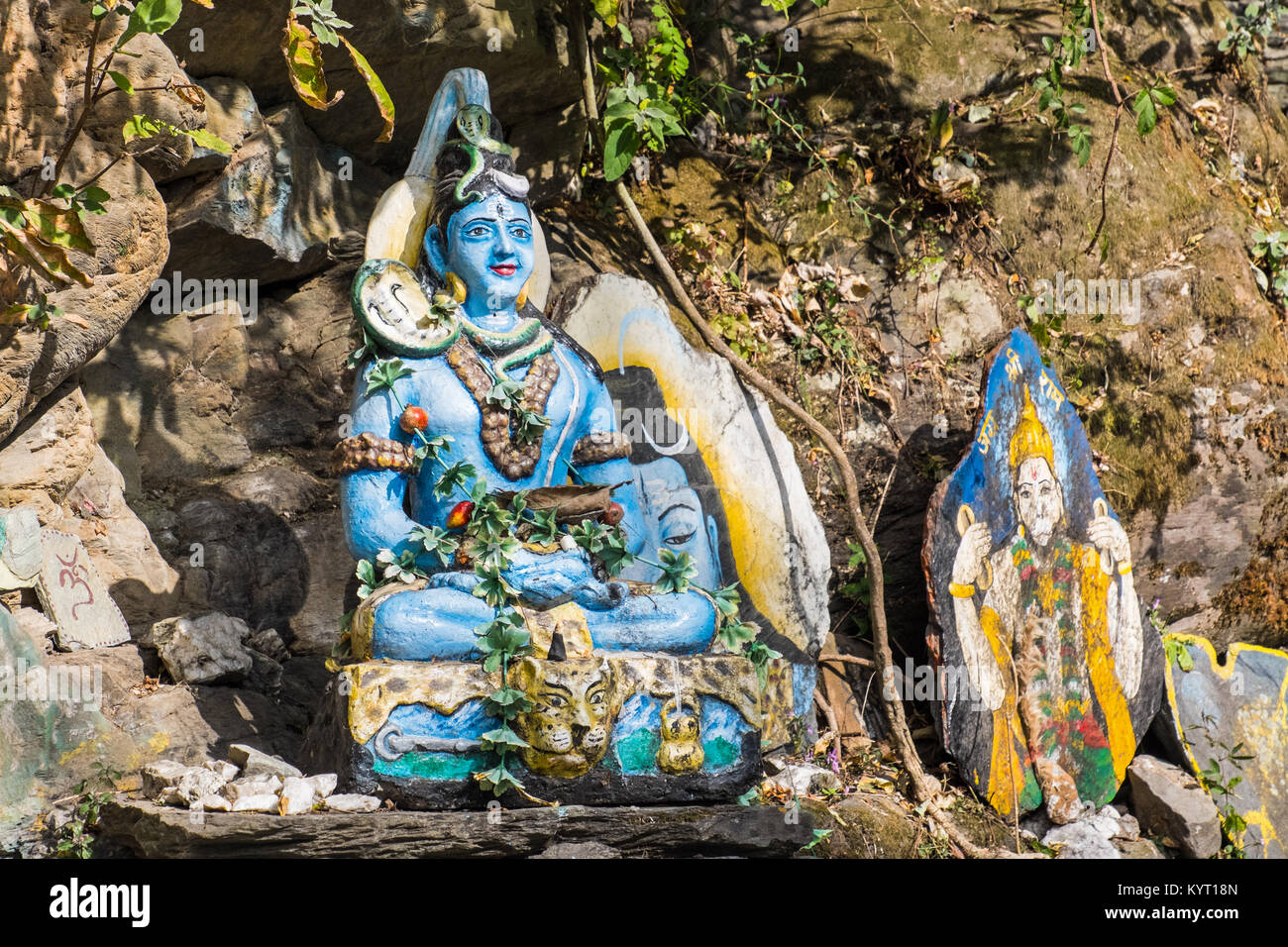religious statues on a footpath near Daramshala, India Stock Photo