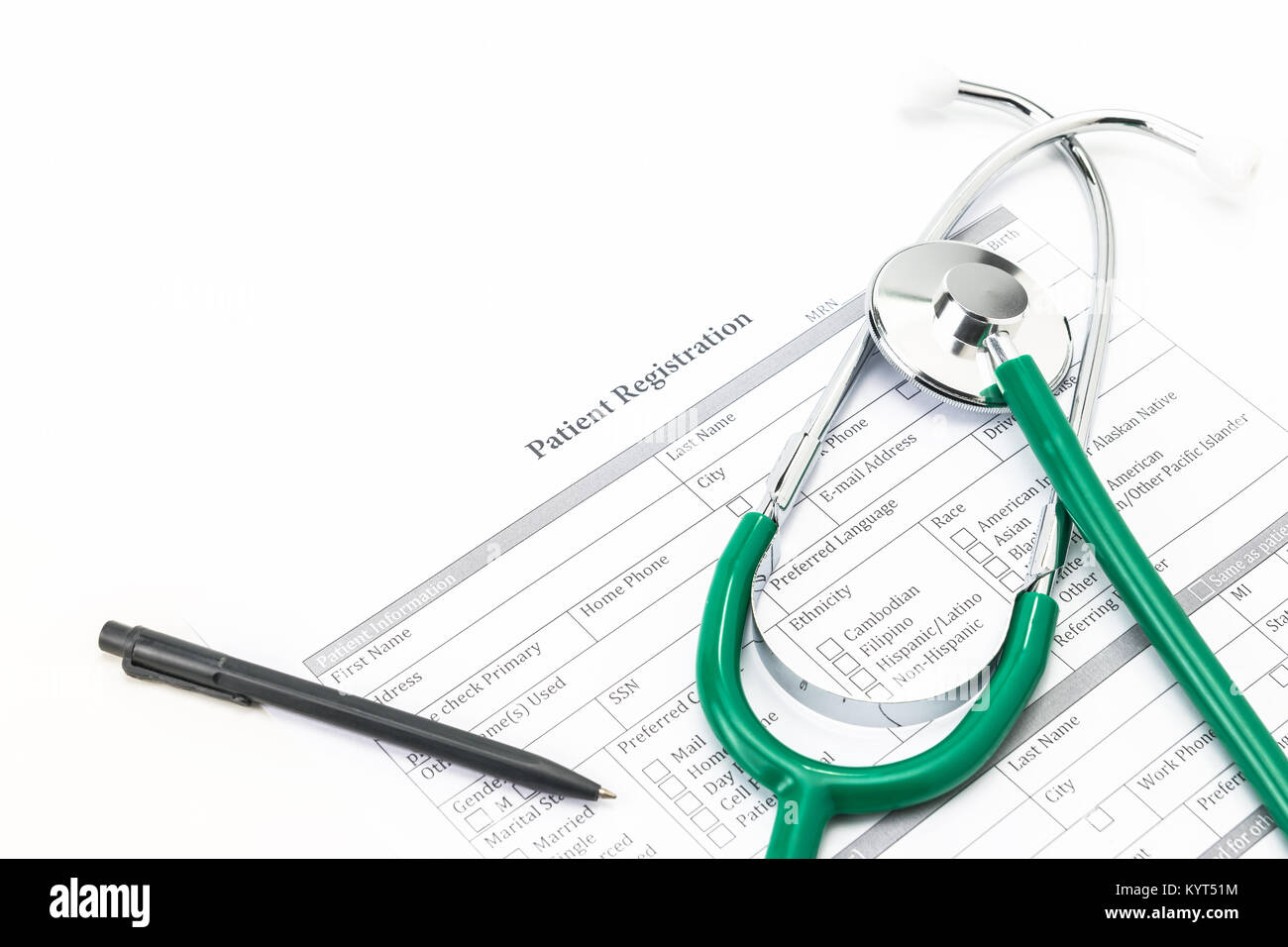 A photo of Stethoscopes and patient registration form on white background - Medical concept Stock Photo