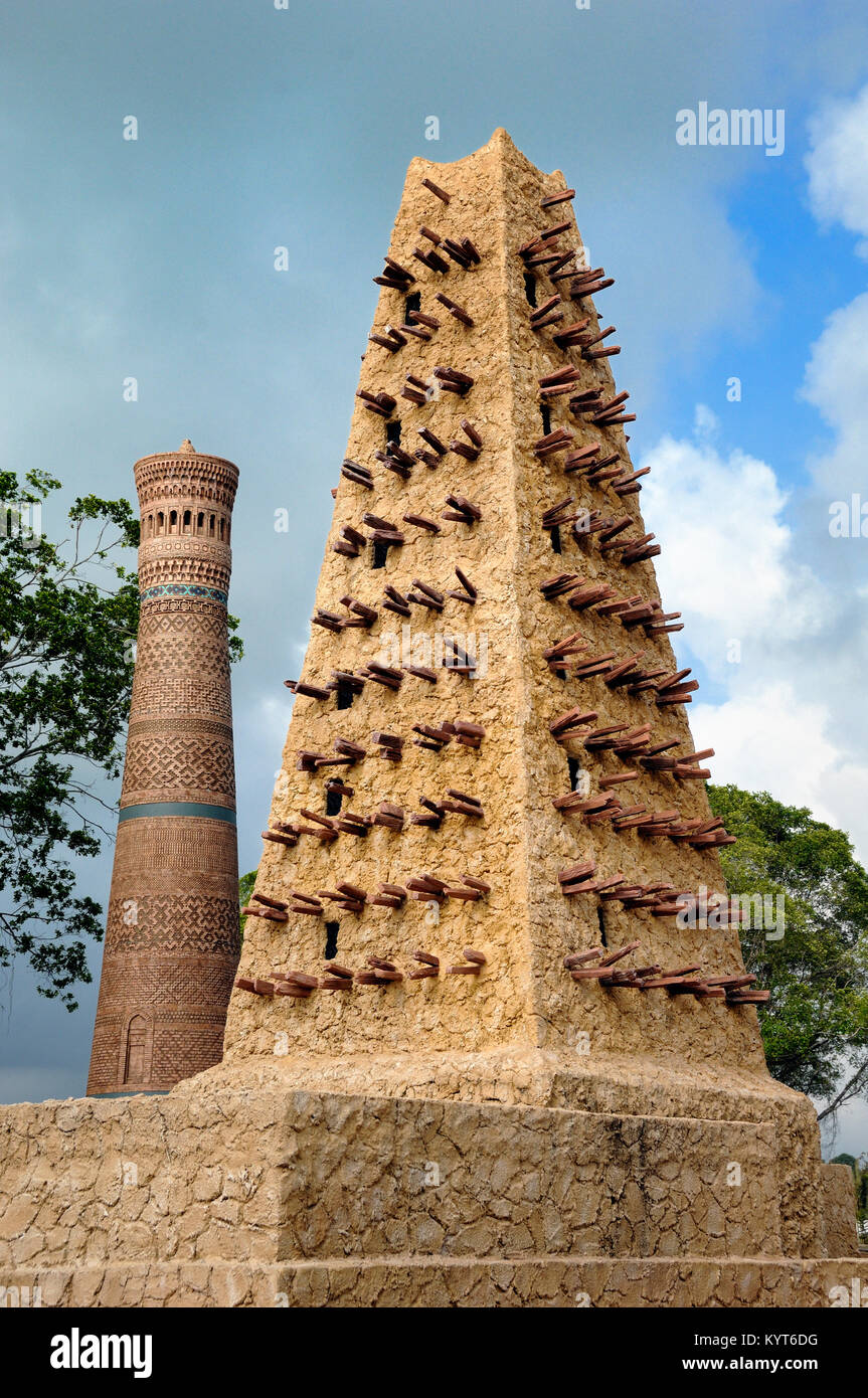 Replica of Great Mosqe of Agadez Niger & Kalyan Mosque Minaret, Uzbekistan at Islamic Heritage Theme Park, Kuala Terengganu, Malaysia Stock Photo