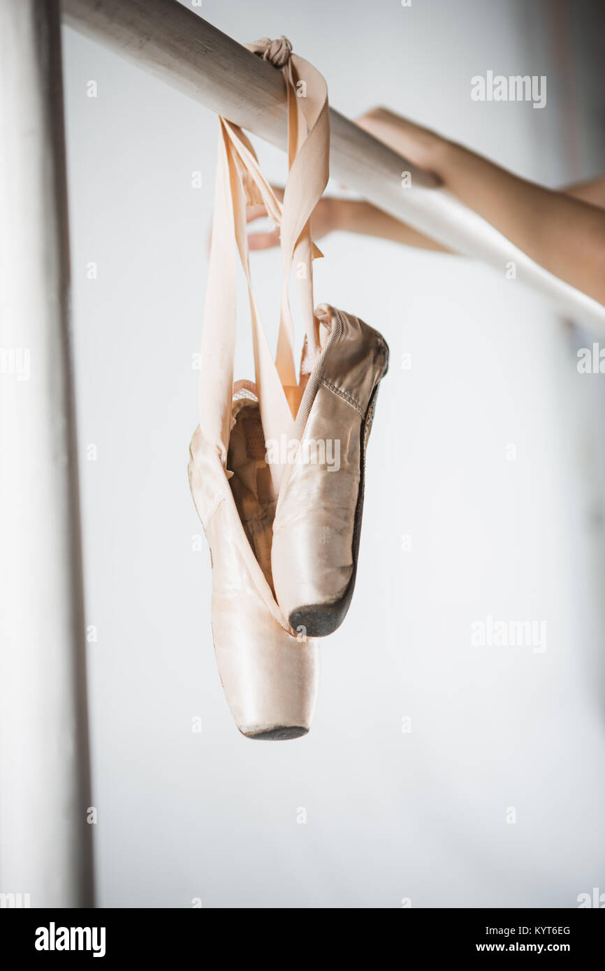 Close up view of pointes for ballet on barre Stock Photo