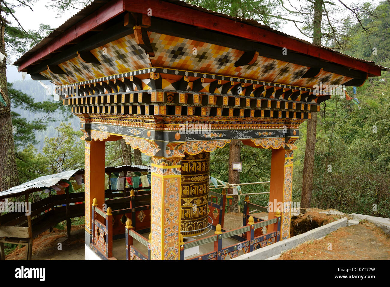 Prayer wheel on trail up to Tango monastery, near Thimphu, Bhutan Stock Photo