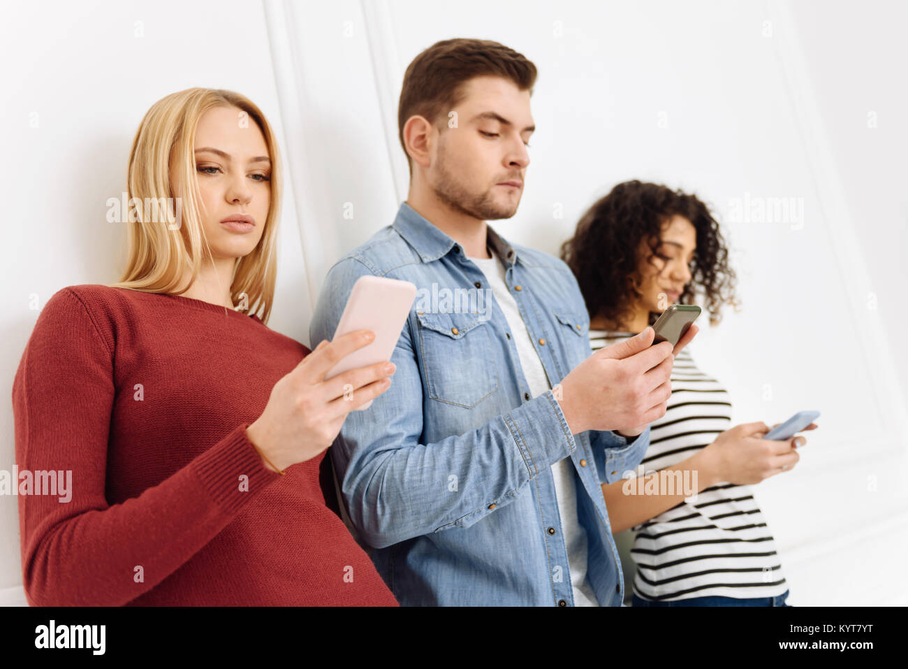 Serious young people being deep in thoughts Stock Photo Alamy