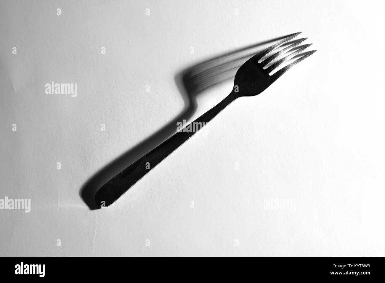 Fork isolated with creative shadow Stock Photo Alamy