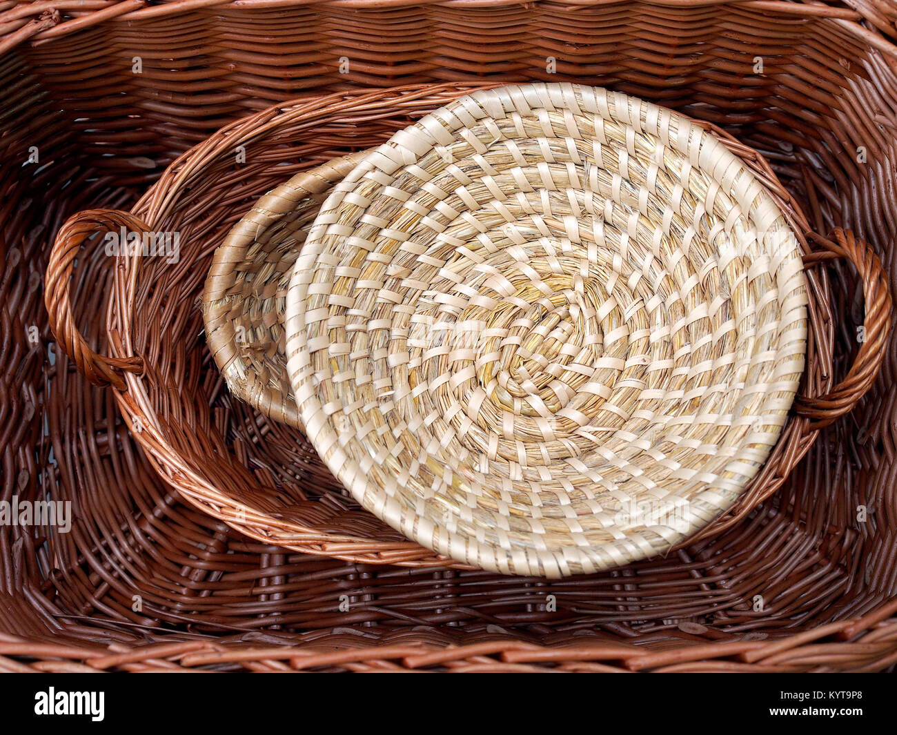 Pile of wicker baskets on sale in public street market Stock Photo Alamy