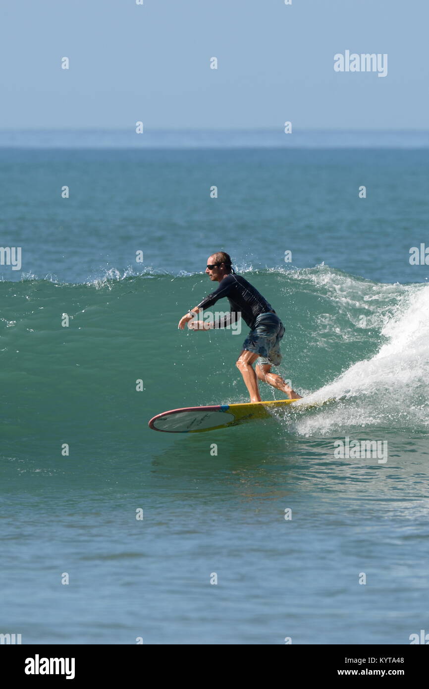 Surfing on the Nicoya Peninsula Stock Photo