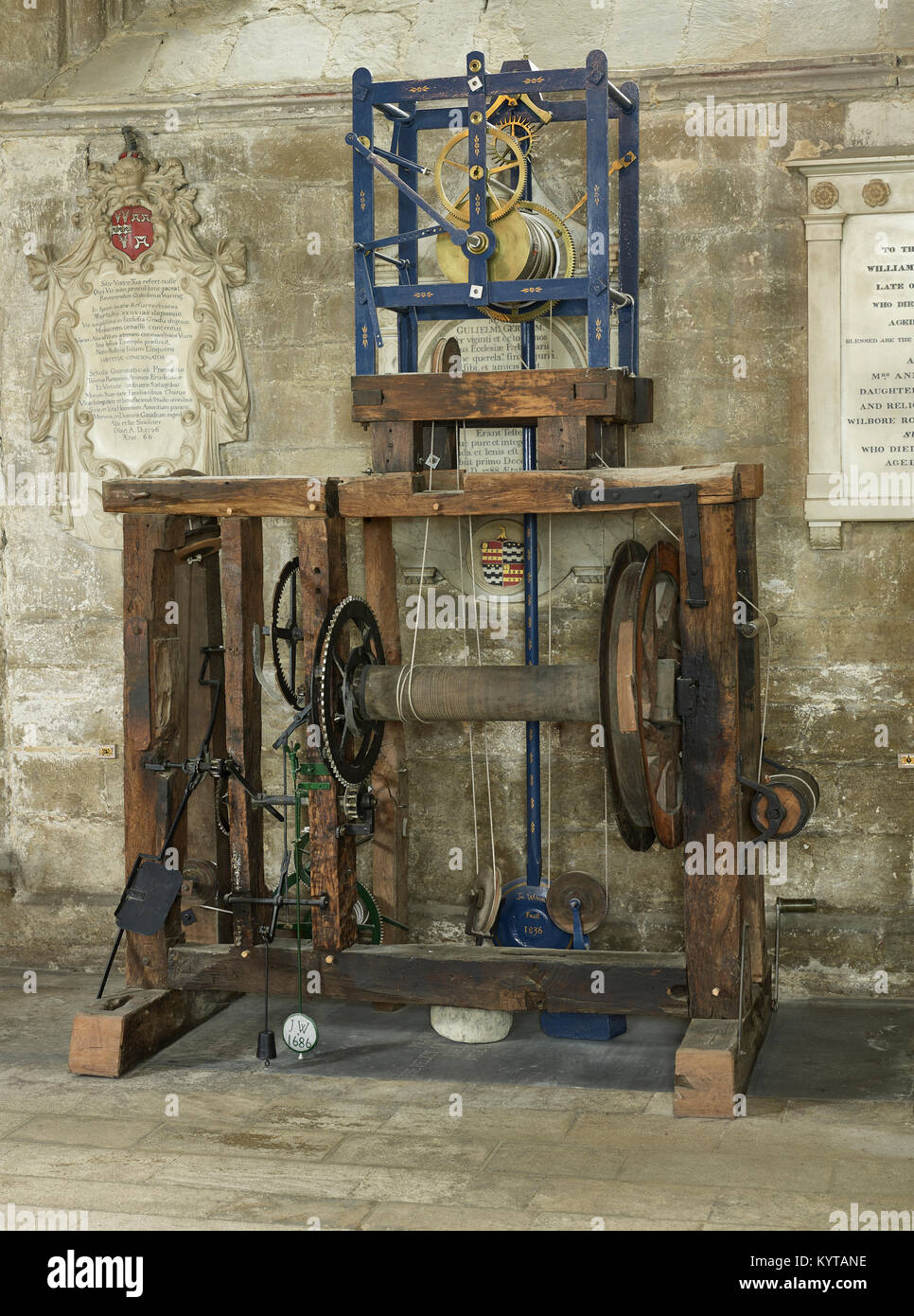Peterborough Cathedral. Clock movement driven by weights, in the north quire aisle. Claimed to be the oldest working clock mechanism in the world unti Stock Photo