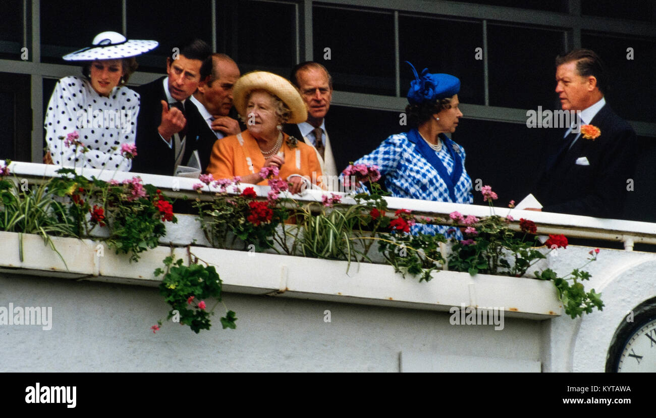Derby Day at Epsom Race Course in 1986. Epsom Surrey England UK 1986 The Royal Family in the Royal Box. Prince Charles, Princess Diana, HM The Queen Mother,HRH Prince Philip, HM The Queen, Stock Photo