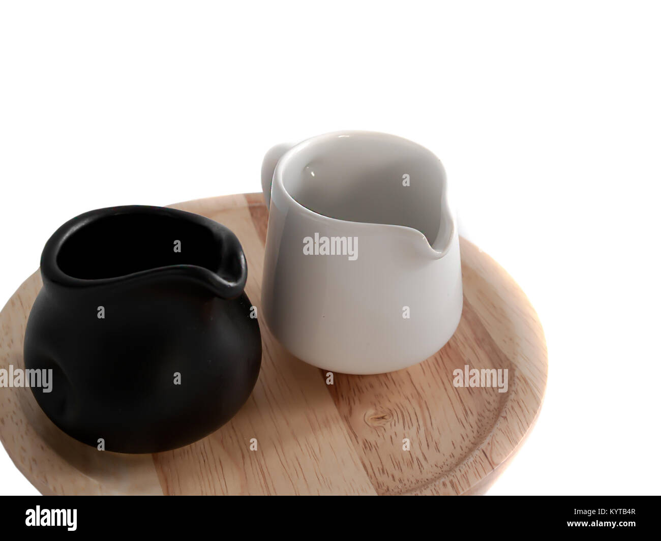 Cup milk, milk containers with white and black. Stock Photo