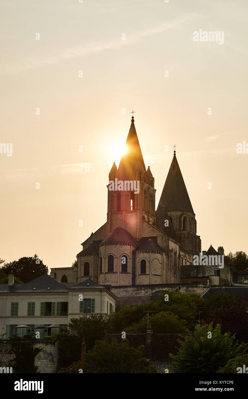 The spires of St Ours church at sunset over the  Cite Royale of Loches in the Loire Valley France. Stock Photo