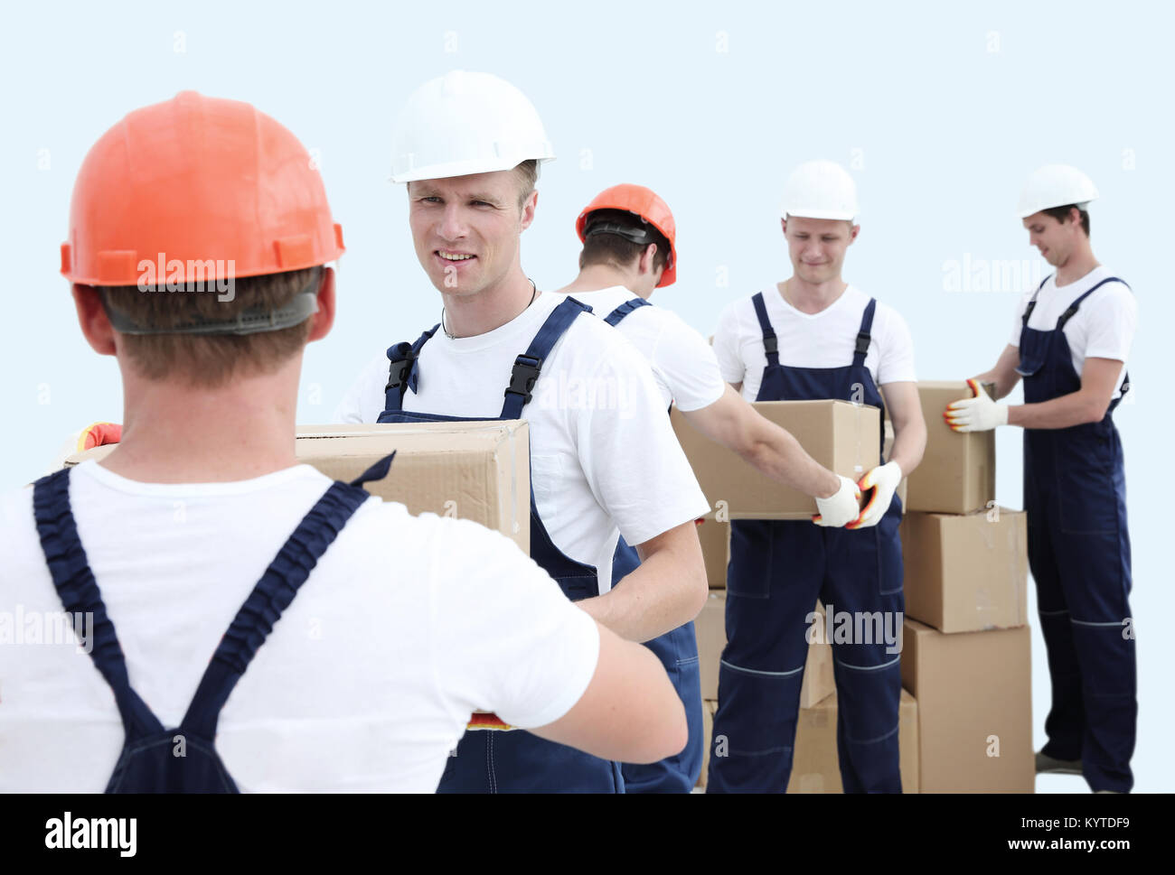Group of people carrying boxes moving hi-res stock photography and ...
