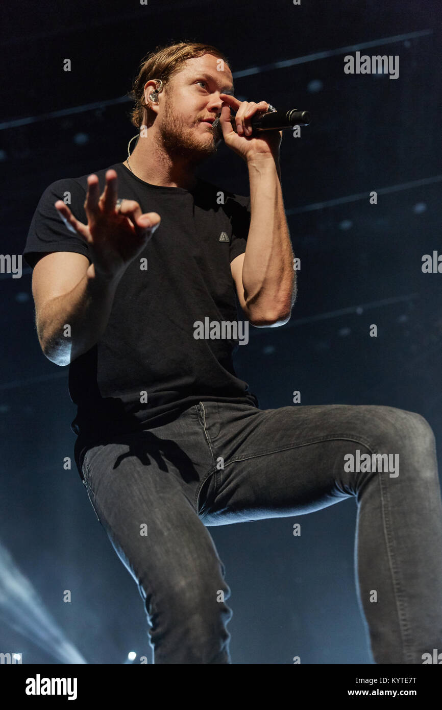 The American rock band Imagine Dragons performs a live concert at Spektrum in Oslo. Here lead singer and songwriter Dan Reynolds is seen live on stage. Norway, 20/10 2015. Stock Photo