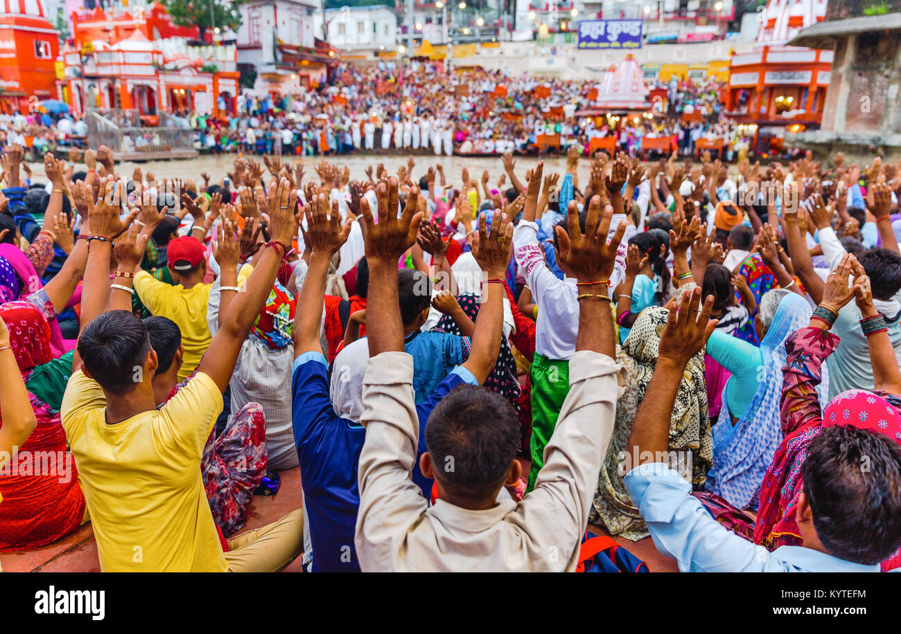 Thousands of Hindu Pilgrims/ People in the holy city of Haridwar in Uttarakhand, India during the evening light ceremony called Ganga arthi to worship Stock Photo