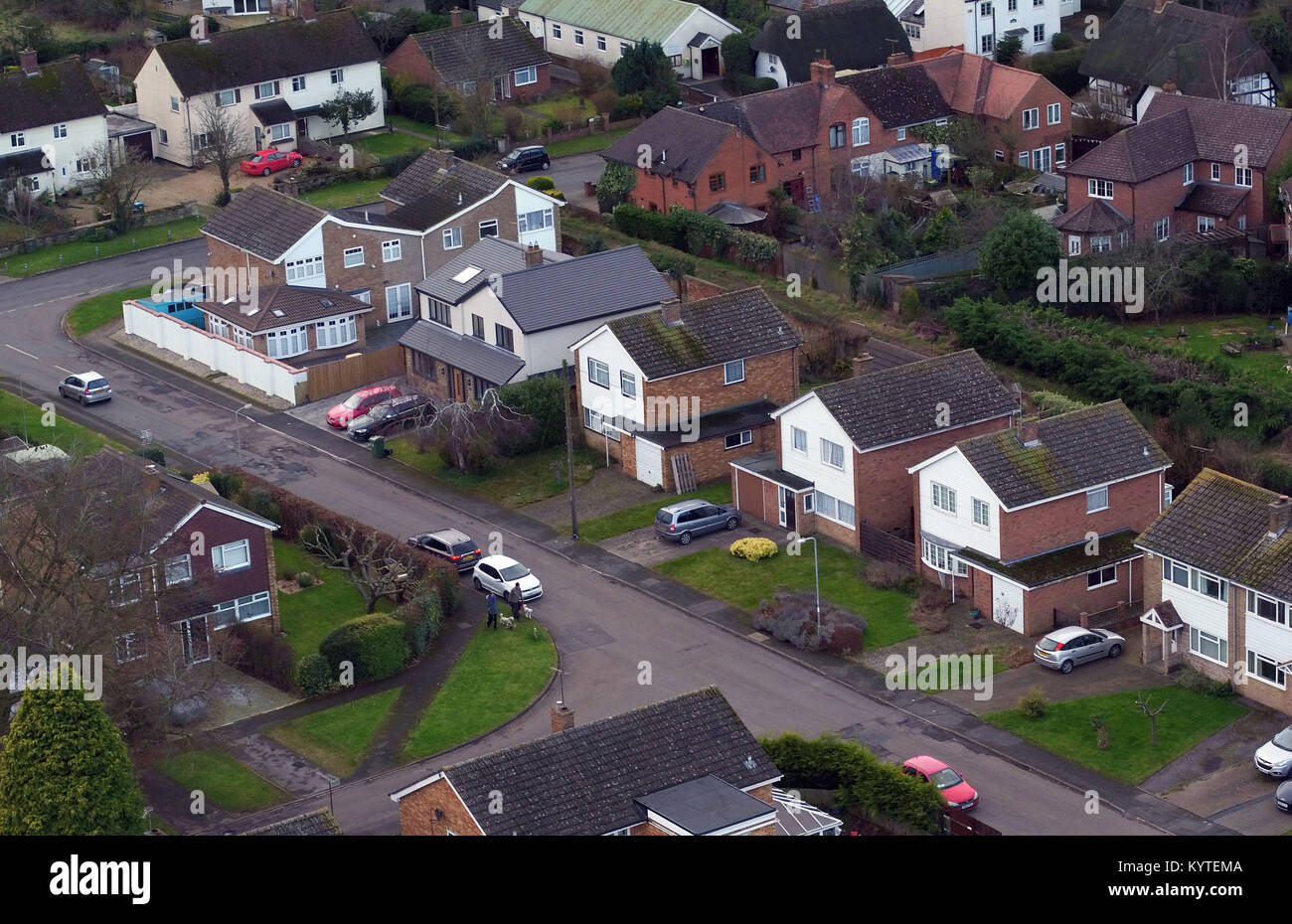 Aerial view of Manor Park in Maids Moreton, near Buckingham, Buckinghamshire of the former homes of Peter Farquhar (second house from top with two cars in the front) and Ann Moore-Martin (second house from right with no car in front). Police have launched a murder investigation into the deaths of two elderly residents, Farquhar and Moore-Martin, from the village who died more than a year-and-a-half apart. Stock Photo