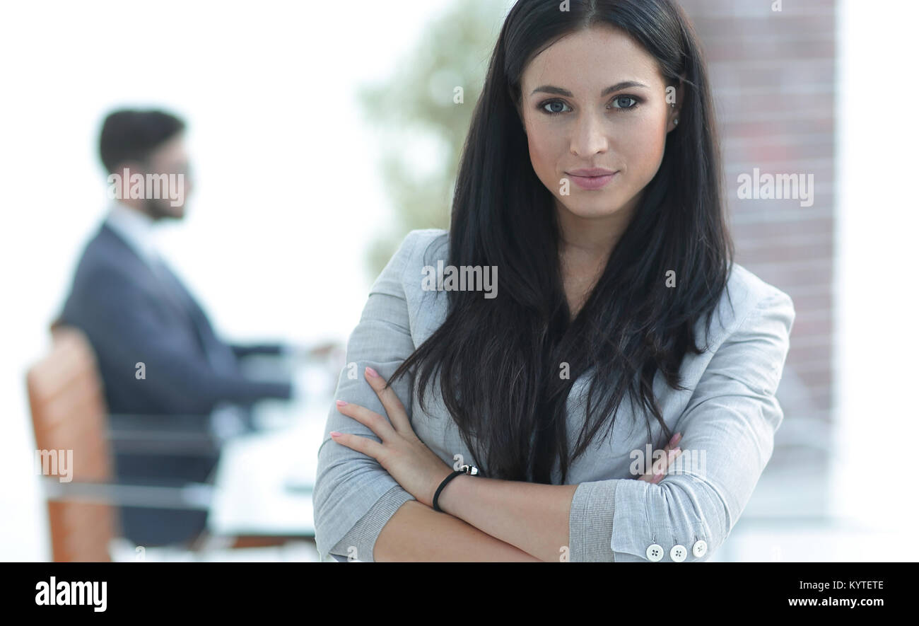 successful young business woman on the office background Stock Photo ...