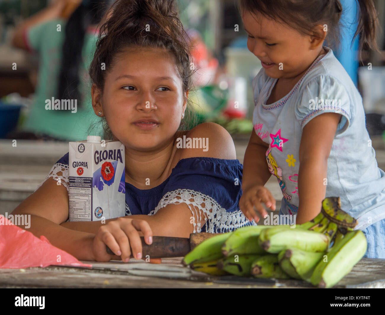 Iquitos, Peru- December 14, 2017: Young peruvian girl making funny faces Stock Photo
