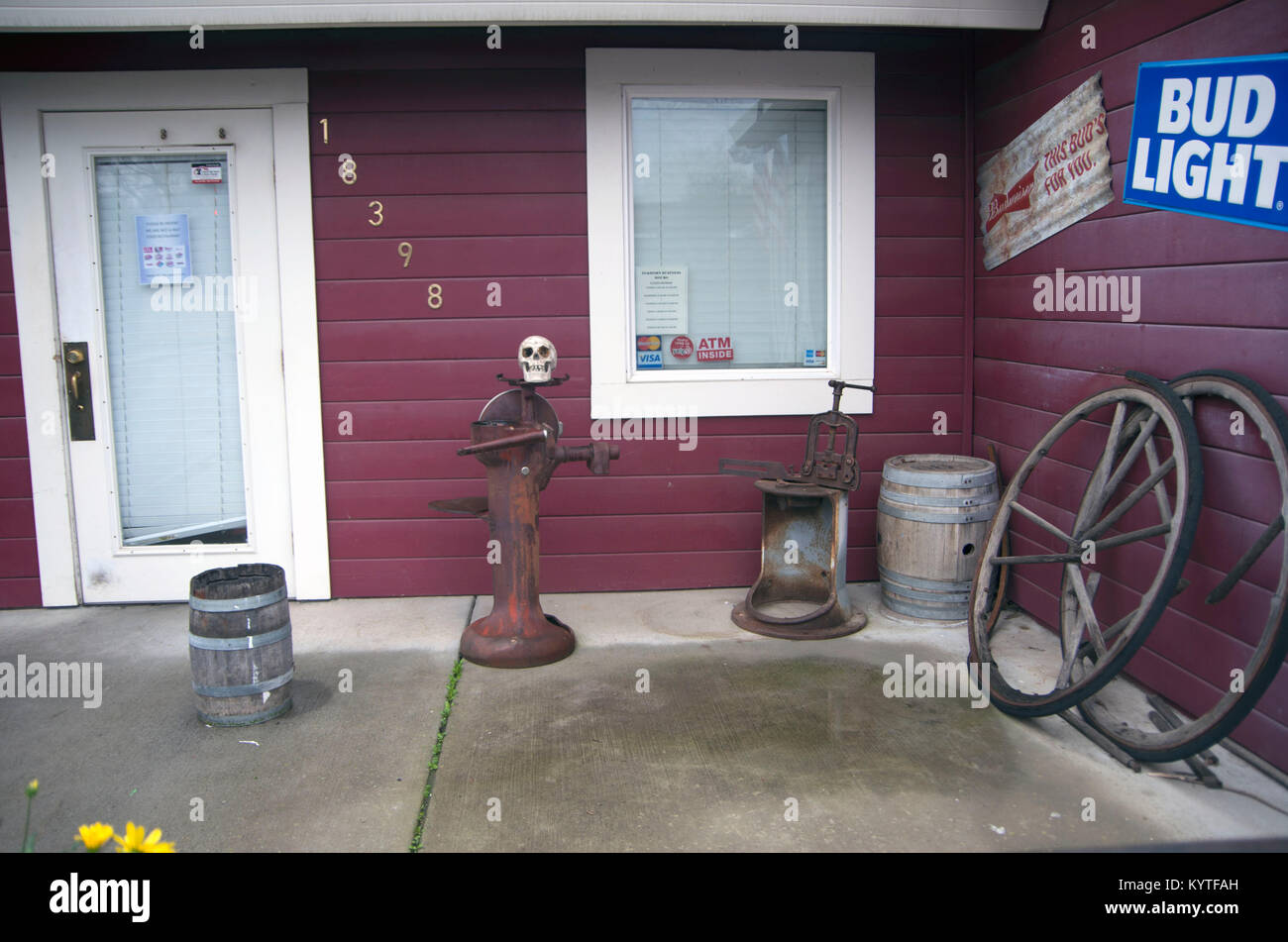 A bar in Yolo County, CA draws people in with a skull in the front patio. Stock Photo
