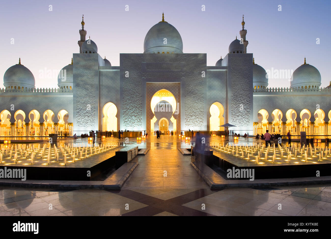 ABU DHABI, UNITED ARAB EMIRATES - DEC 31, 2017: Exterior of the Sheikh Zayed Mosque in Abu Dhabi in twilight. It is the largest mosque in the country. Stock Photo