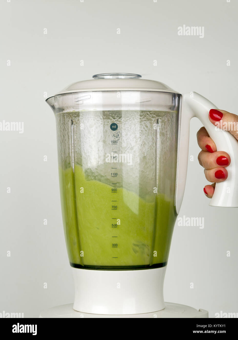 A green fruit and vegetable smoothie in a blender jug Stock Photo Alamy