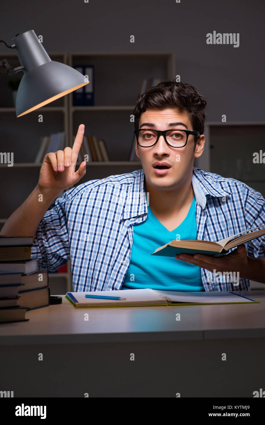 Student preparing for exams late night at home Stock Photo - Alamy