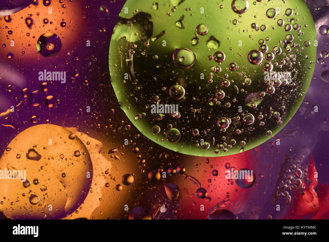 Unusual colorful background with oil drop circles and air bubbles that