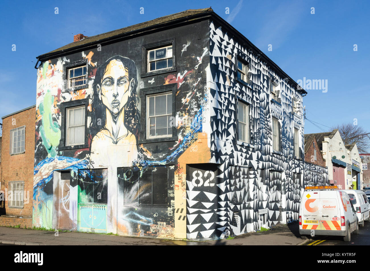 An empty building in Fazeley Street in the Digbeth area of Birmingham is completely covered by graffiti and street art. Stock Photo