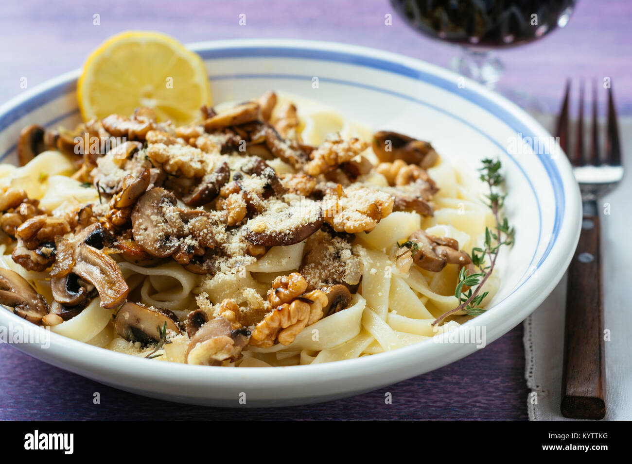 Tagliatelle pasta with a mushroom walnut Sauce Stock Photo Alamy